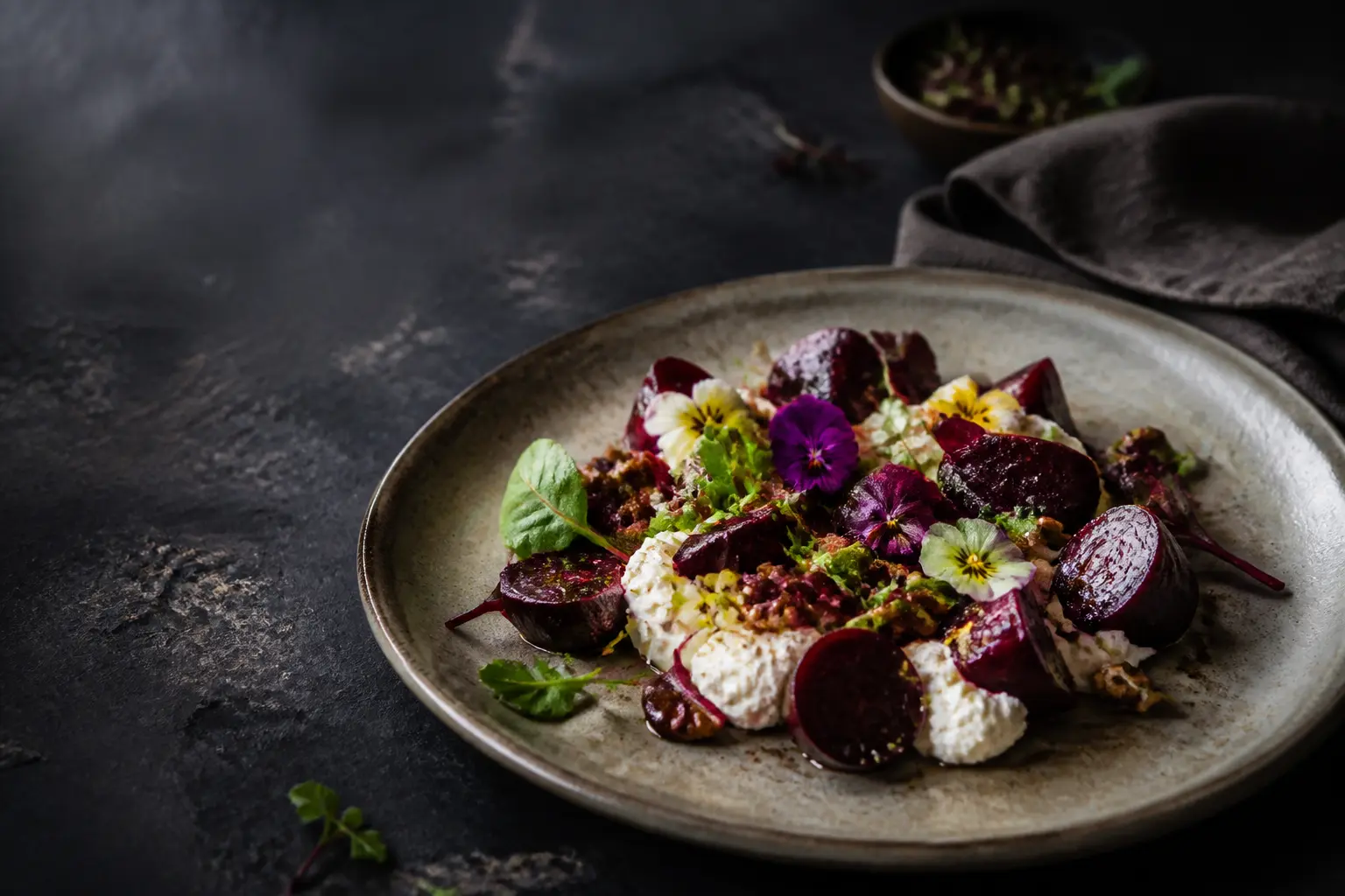 Roasted beetroot with goat's curd and edible flowers